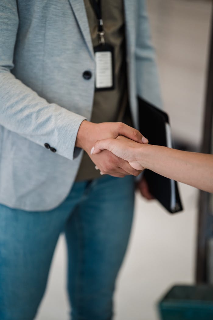 Man and Woman during Handshake